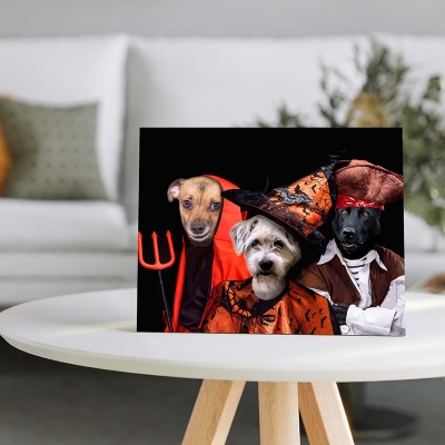portrait of dogs in halloween costume combination